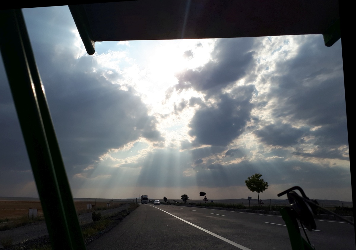 Those beams of sunlight, just missing our rooftop sadly